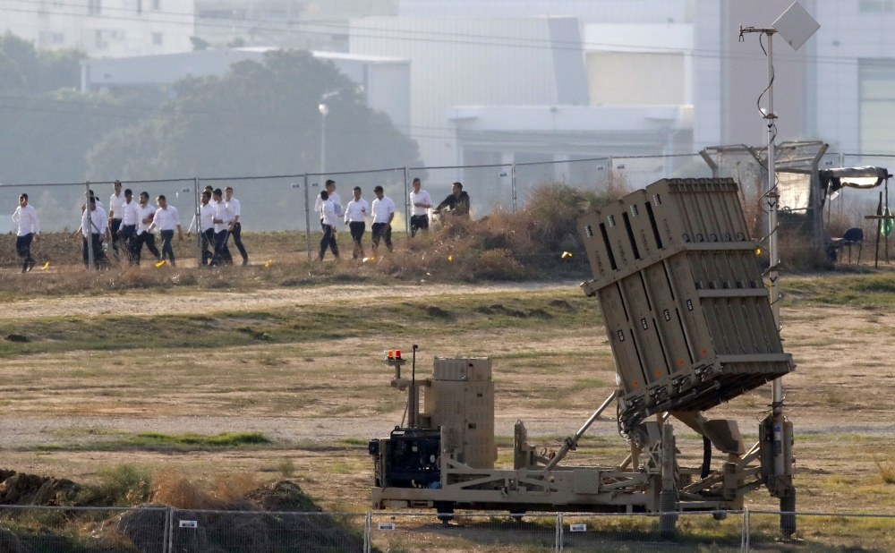 An Israeli missile launched from the Iron Dome defense missile system, designed to intercept and destroy incoming short-range rockets and artillery shells, is pictured in the southern Israeli city of Sderot on Tuesday. -AFP 