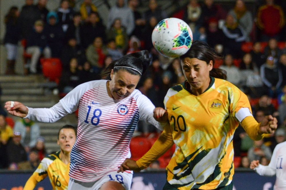 Australia's forward Sam Kerr (L) speaks with the referee during an international friendly football match between Australia and Chile at Coopers Stadium in Adelaide on Tuesday. — AFP