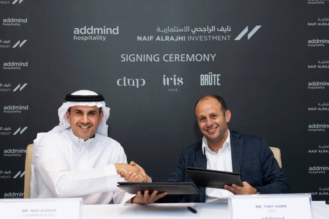 Naif Saleh Alrajhi, Chairman and Chief Executive Officer of Naif Alrajhi Investment, and Tony Habre, Chief Executive Officer of Addmind Hospitality, shake hands after the signing of agreement 