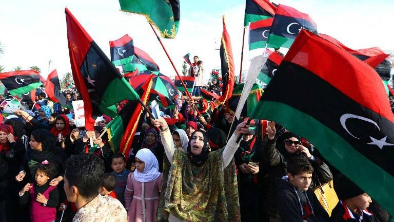 Libyans celebrate on Feb. 17, 2015 ahead of the upcoming fourth anniversary of the Libyan revolution which toppled dictator Muammar Gadhafi. — AFP