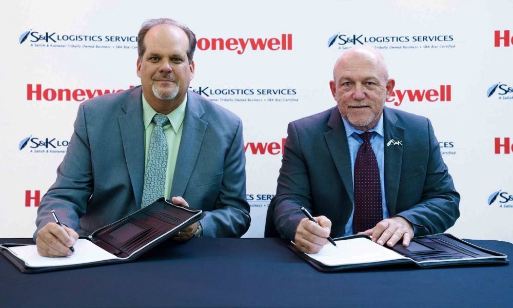 Jim Currier (left), president, Europe, Middle East, Africa, and India at Honeywell Aerospace and John Sims, president of S&K Logistics Services sign a new deal Sunday at Dubai Airshow