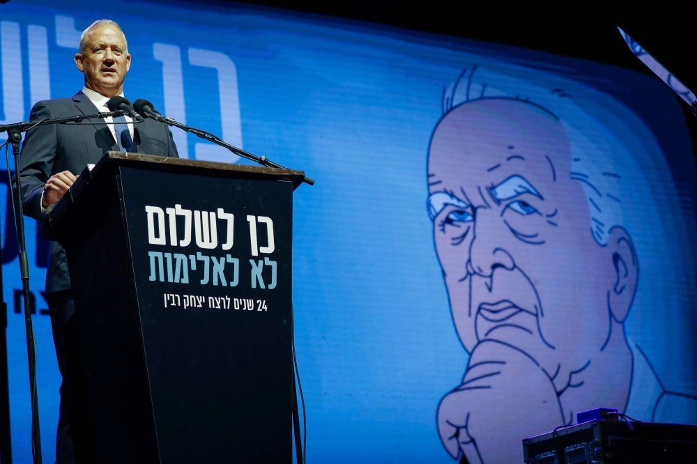 Israeli Kahol Lavan (Blue and White) political alliance leader and retired Israeli General Benny Gantz addresses the crowds during a rally to mark the 24nd anniversary of the assassination of former Israeli Prime Minister Yitzhak Rabin, at Rabin Square in Tel Aviv, in this Nov. 2, 2019 file photo. — AFP