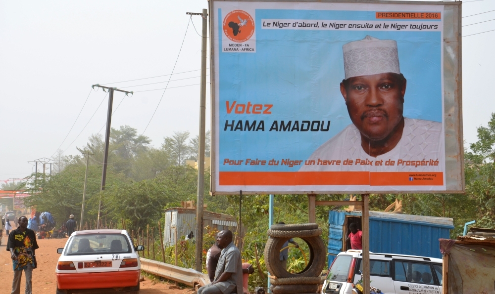 A campaign poster depicting then Niger's leading opposition figure and contender in the presidential election Hama Amadou is seen in Niamey in this Feb. 2, 2016 file photo. — AFP