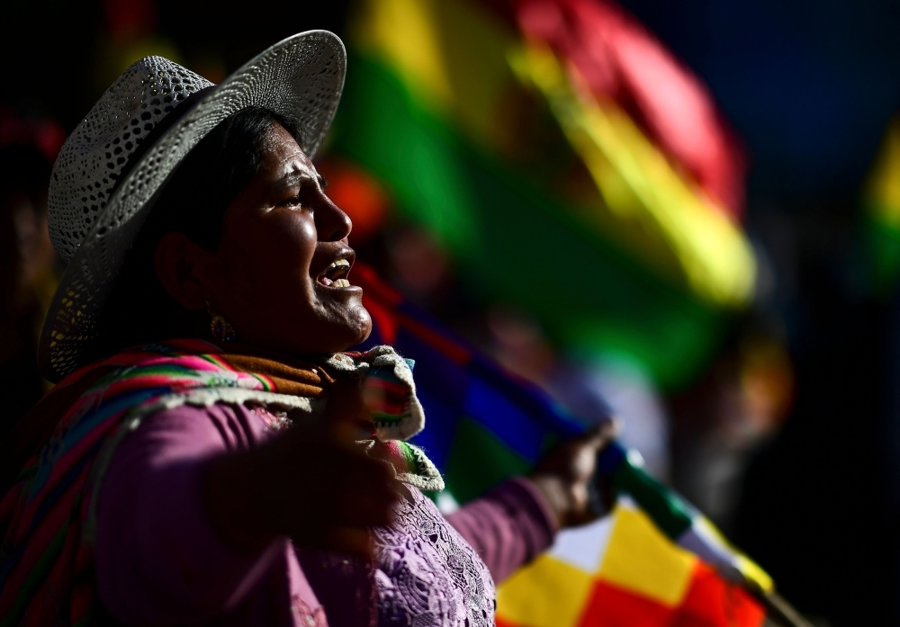 Supporters of Bolivian ex-President Evo Morales shout slogans during a demonstration in Cochabamba, on Monday. -AFP
