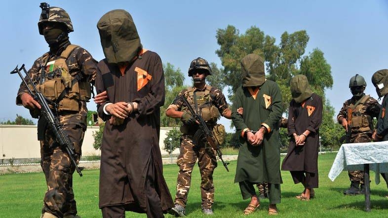 Afghan security personnel escort arrested alleged Taliban and Daesh (the so-called IS) militants during an operation in Jalalabad province in this Oct. 1, 2019 file photo. — AFP