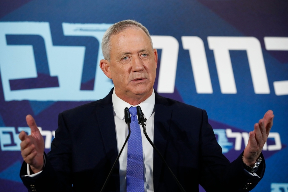 Israeli Kahol Lavan (Blue and White) political alliance leader and retired General Benny Gantz gives a statement ahead of a midnight deadline in the coastal city of Tel Aviv on Wednesday. — AFP