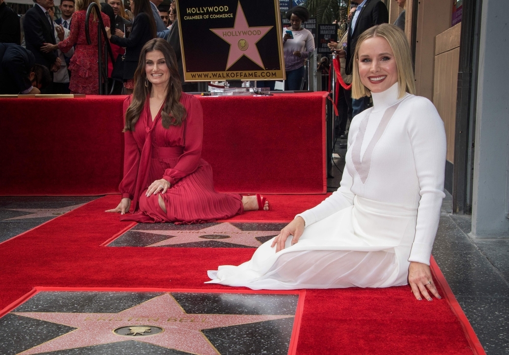 Idina Menzel, left, Mayor Eric Garcetti, center, and Kristen Bell, right, on The Hollywood Walk of Fame in Hollywood, California, in this Nov. 19, 2019 file photo. — AFP