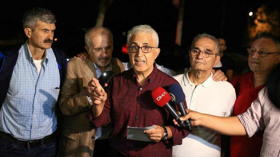 Former Cumhuriyet journalists speak to the press after their release from jail in this Sept. 12, 2019 file photo.