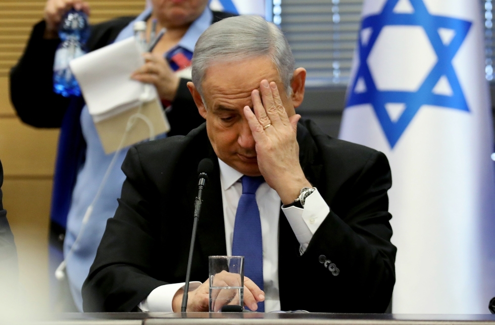Israeli Prime Minister Benjamin Netanyahu gestures as he speaks during a meeting of the right-wing bloc at the Knesset (Israeli parliament) in Jerusalem in this Nov. 20, 2019 file photo. — AFP