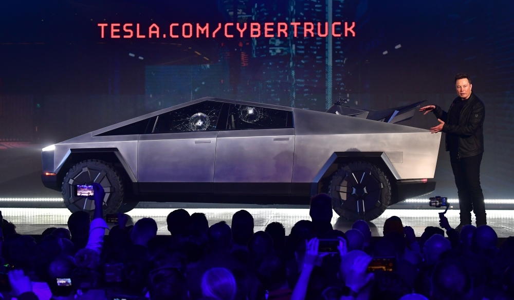 Tesla co-founder and CEO Elon Musk gestures while wrapping up his presentation of the newly unveiled all-electric battery-powered Tesla Cybertruck at Tesla Design Center in Hawthorne, California, on Thursday. — AFP