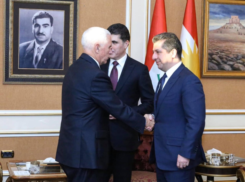 This handout photograph released by the Kurdistan Regional Government (KRG) on Saturday shows US Vice President Mike Pence (C-L) meeting with Iraqi Kurdish Region President Nechirvan Barzani (C-R) in Arbil, the capital of the autonomous Kurdish region of northern Iraq. -AFP