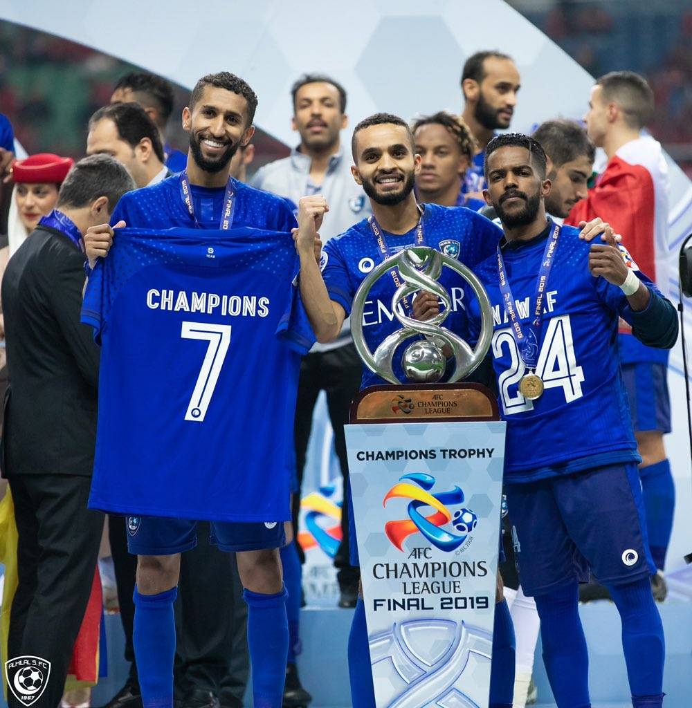  Al Hilal team poses with the AFC Champions League Cup at Saitama, Japan on Sunday. 