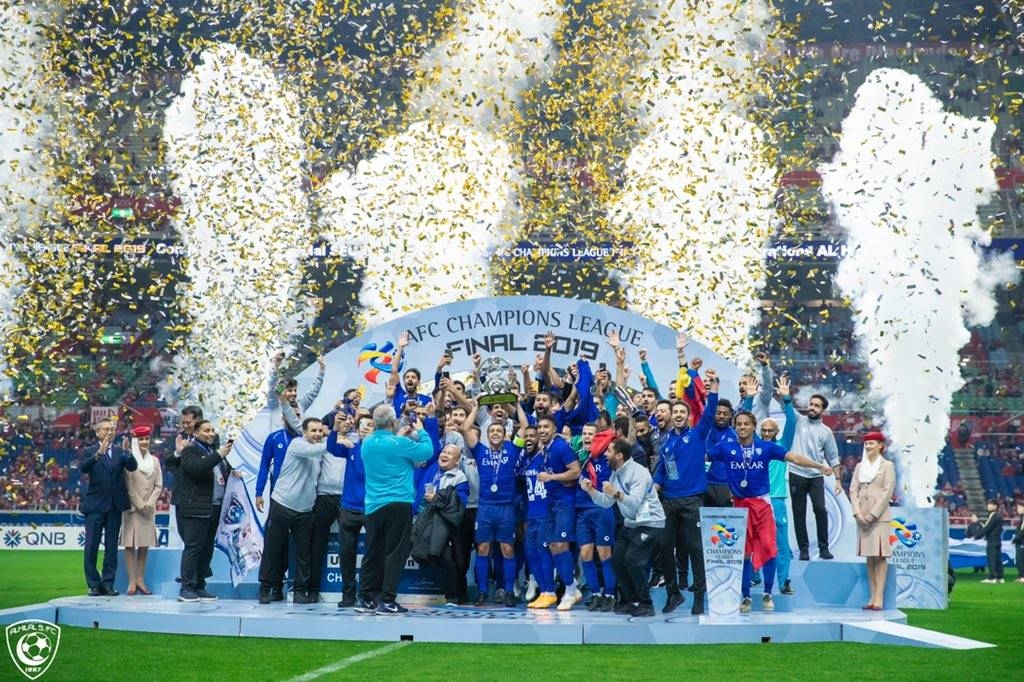  Al Hilal team poses with the AFC Champions League Cup at Saitama, Japan on Sunday. 