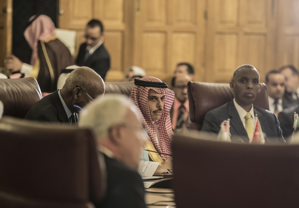 Foreign Minister Faisal Bin Farhan (C) attends an emergency meeting at the Arab League headquarters in the Egyptian capital Cairo, on Monday, to discuss the US decision to no longer consider Israeli settlements in Palestinian Territories illegal. — AFP