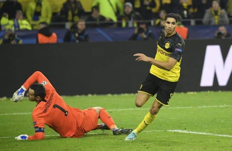 Achraf Hakimi (R) scored the winning goal in Borussia Dortmund's 3-2 come-back win against Inter Milan three weeks ago in the Champions League. — AFP
