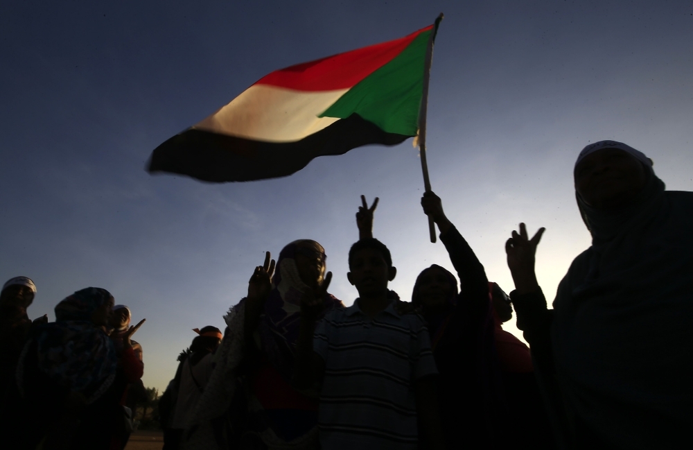 Sudanese women march in Khartoum to mark International Day for Eliminating Violence against Women, in the first such rally held in the northeast African country in decades, on Monday. — AFP