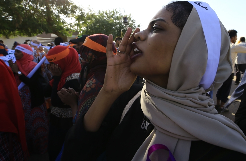 Sudanese women march in Khartoum to mark International Day for Eliminating Violence against Women, in the first such rally held in the northeast African country in decades, on Monday. — AFP