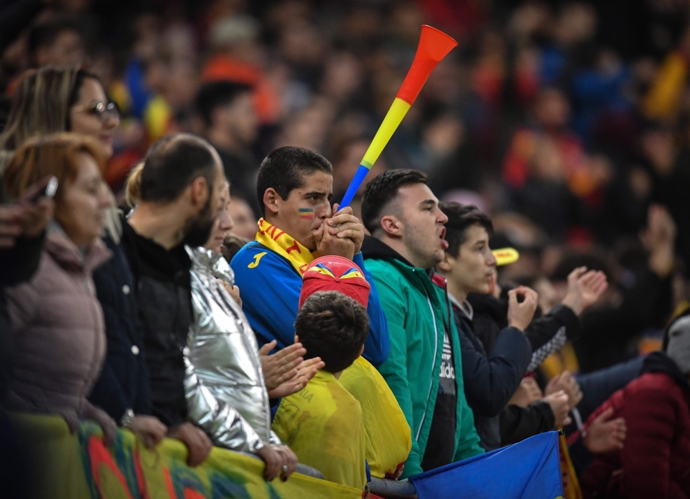 Romania's national football team fans are pictured during the  UEFA EURO 2020 qualifier match against Sweden at the National Arena stadium in Bucharest, on Nov. 15, 2019. Bucharest will host the UEFA Euro 2020 draw on Saturday. — AFP