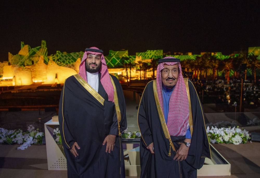  Custodian of the Two Holy Mosques King Salman and Crown Prince Muhammad Bin Salman are seen during the inauguration of the Diriyah Gate project in this Nov. 20, 2019 file photo. (SPA)