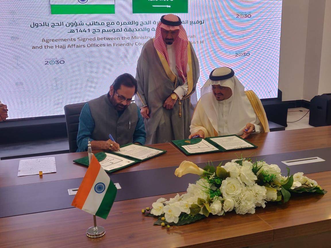 Minister of Haj Mohammad Saleh Benten and India’s Minister of Minority Affairs Mukhtar Abbas Naqvi signing Saudi-India bilateral agreement for the arrangements of Haj 2020 at his office in Jeddah on Sunday. Several officials and diplomats from both the countries attended the ceremony.