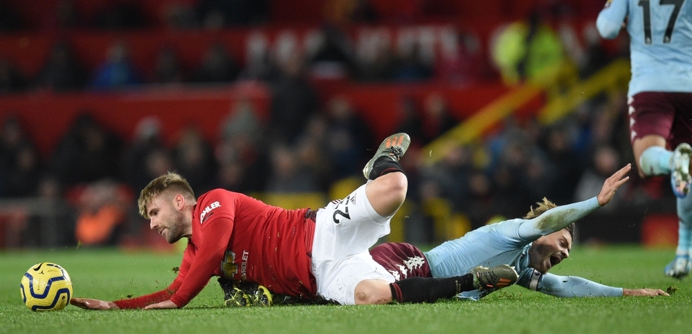 Manchester United's Swedish defender Victor Lindelof (C) heads their second goal during the English Premier League football match between Manchester United and Aston Villa at Old Trafford in Manchester, north west England, on Sunday. — AFP
