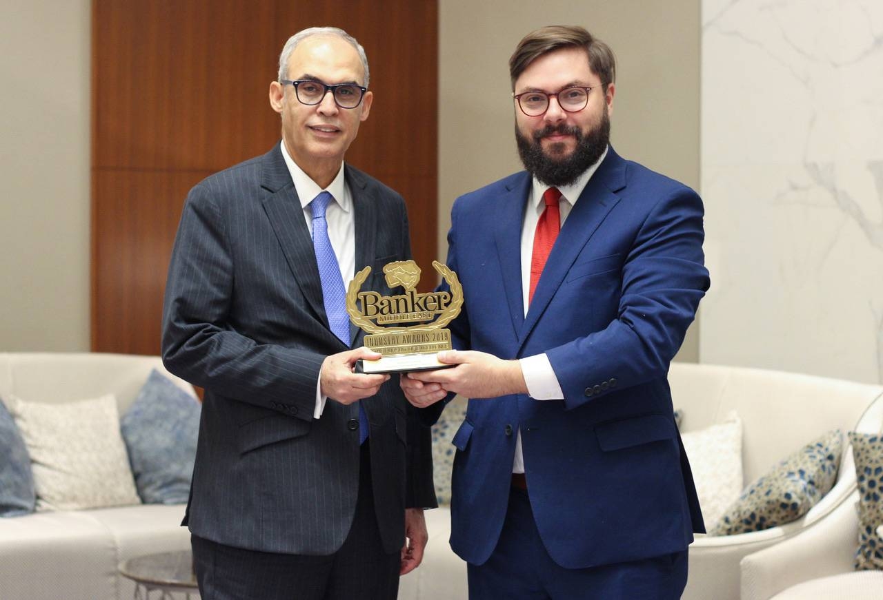 CBB Governor Rasheed Al Maraj (left) receives the Lifetime Achievement Award 