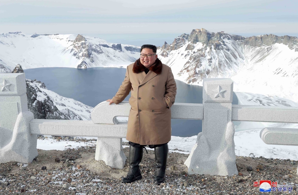 This undated picture released from North Korea's official Korean Central News Agency (KCNA) on Wednesday shows North Korean leader Kim Jong Un posing as he visits battle sites at Mount Paektu, Ryanggang. -AFP