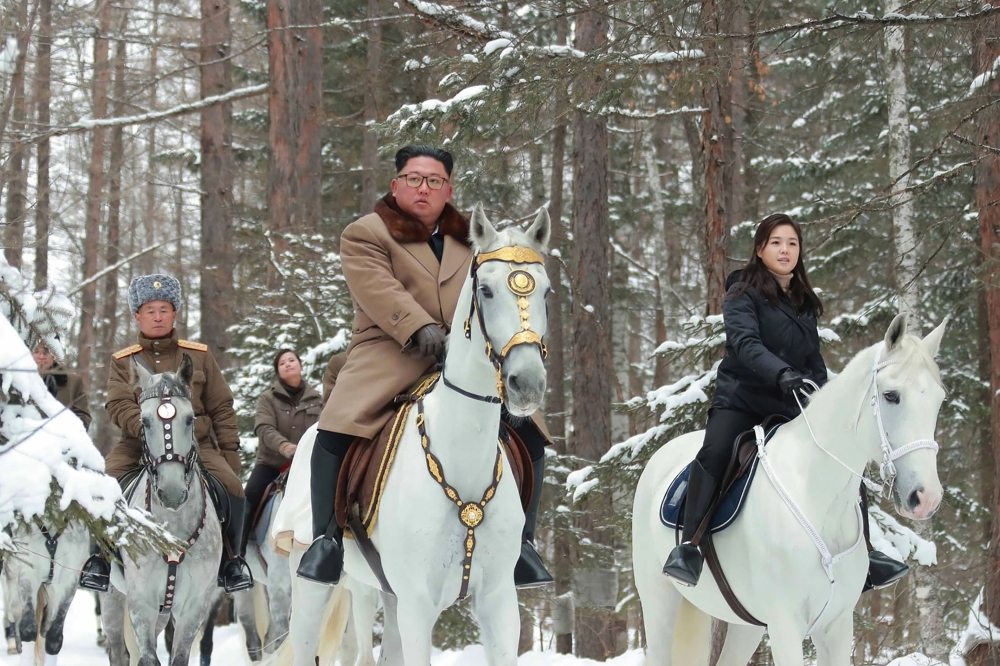 This undated picture released from North Korea's official Korean Central News Agency (KCNA) on Wednesday shows North Korean leader Kim Jong Un posing as he visits battle sites at Mount Paektu, Ryanggang. -AFP