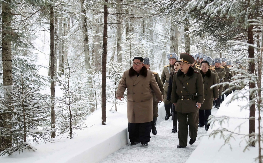 This undated picture released from North Korea's official Korean Central News Agency (KCNA) on Wednesday shows North Korean leader Kim Jong Un posing as he visits battle sites at Mount Paektu, Ryanggang. -AFP