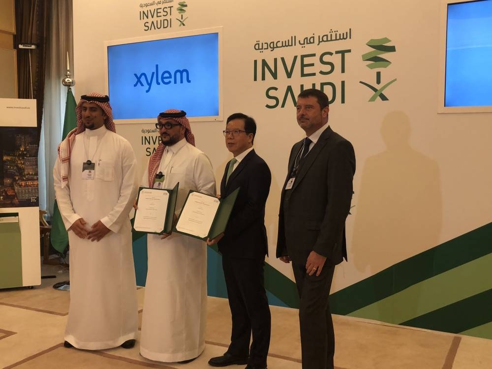 Executives of signatory companies at the signing of agreement