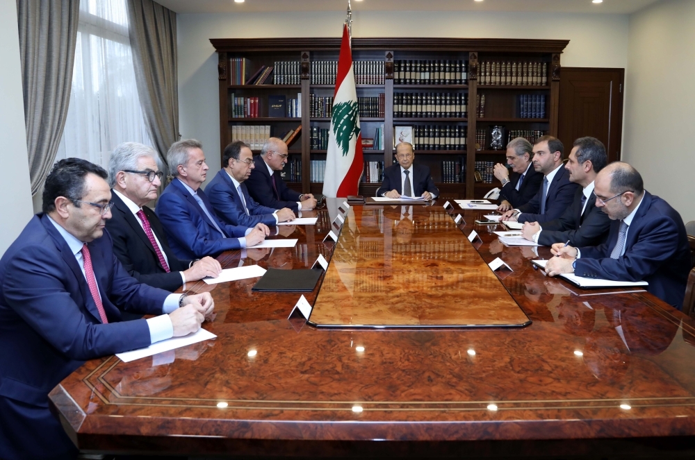 Lebanon's President Michel Aoun, center, meets with Central Bank Governor Riad Salameh, third left, and financial officials at the presidential palace in Baabda, east of the capital Beirut, in this Nov. 29, 2019 file photo. — AFP