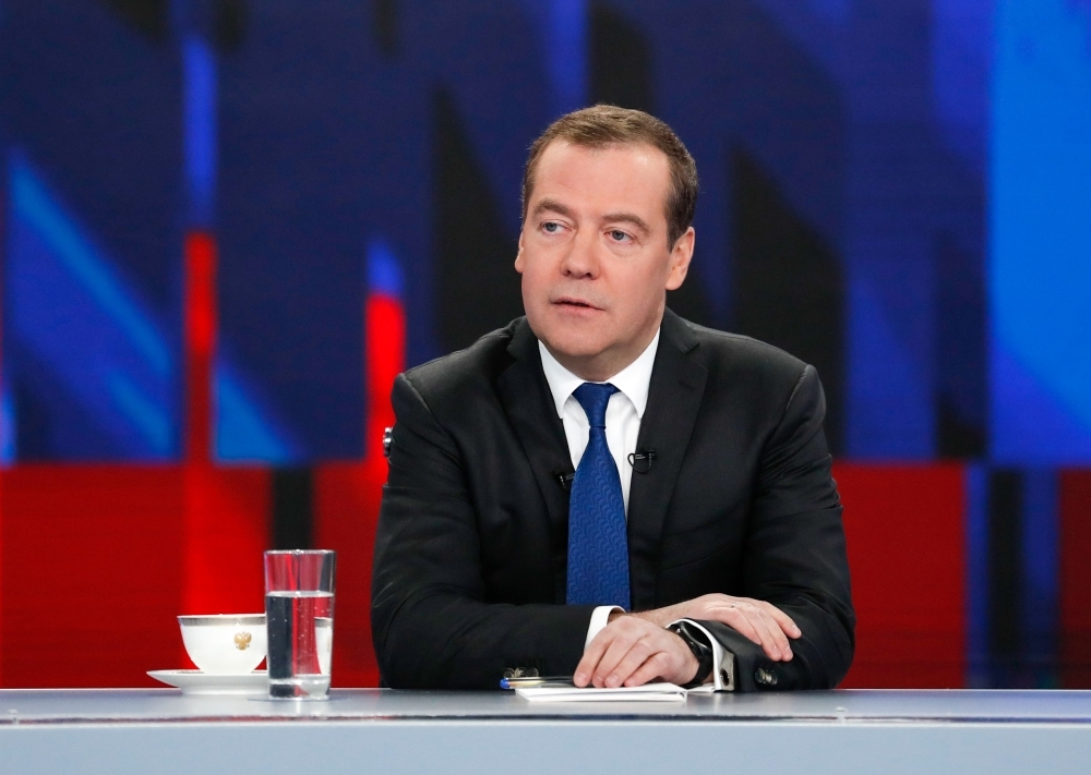 Russian Prime Minister Dmitry Medvedev gives a live interview on the annual results of the government work to journalists of Russia's television channels in Moscow on Thursday. — AFP