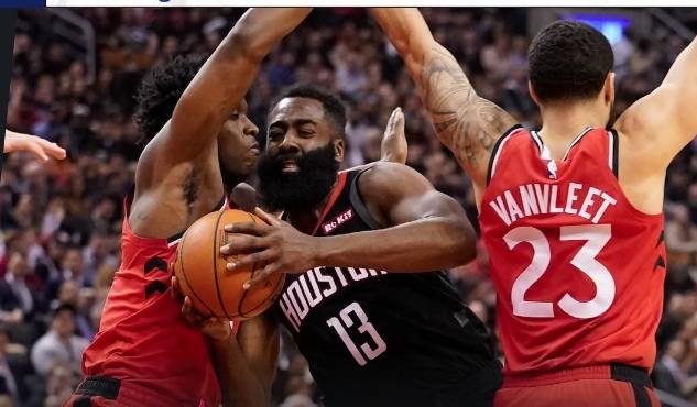 Keen action during the NBA clash between Houston Rockets and Toronto Raptors.