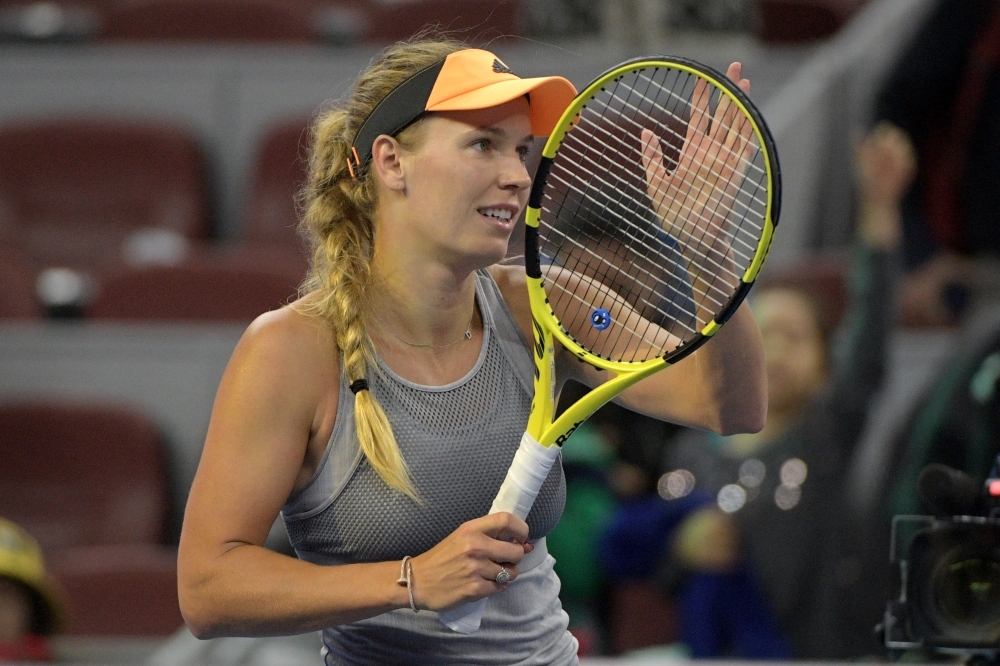 Caroline Wozniacki of Denmark reacts after her women's singles quarter-final match against Daria Kasatkina of Russia at the China Open tennis tournament in Beijing in this Oct. 4, 2019 file photo. — AFP