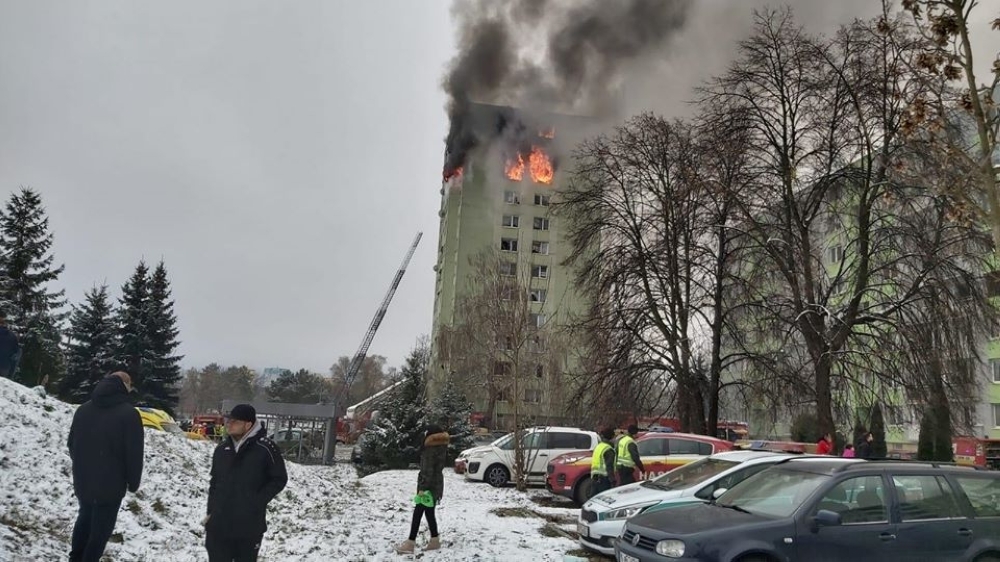 Emergency services work at the scene of a gas explosion in an apartment building in Presov, eastern Slovakia, on Friday. — AFP