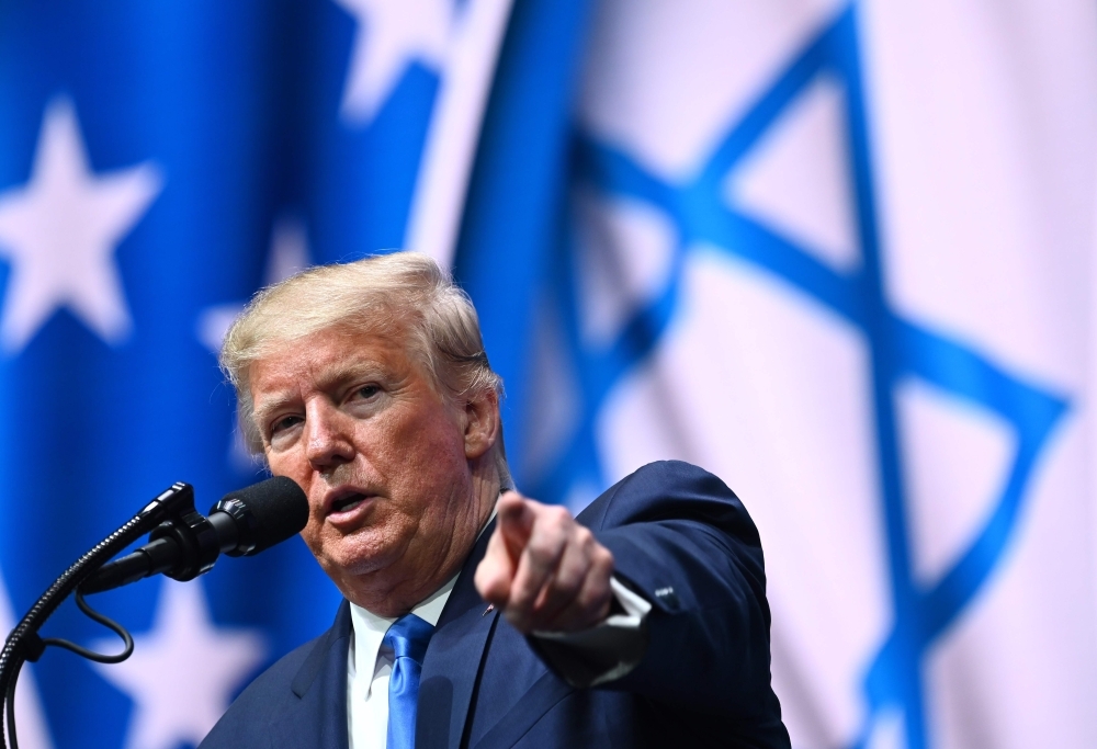 US President Donald Trump addresses the Israeli American Council National Summit 2019 at the Diplomat Beach Resort in Hollywood, Florida, in this Dec. 7, 2019 file photo. — AFP