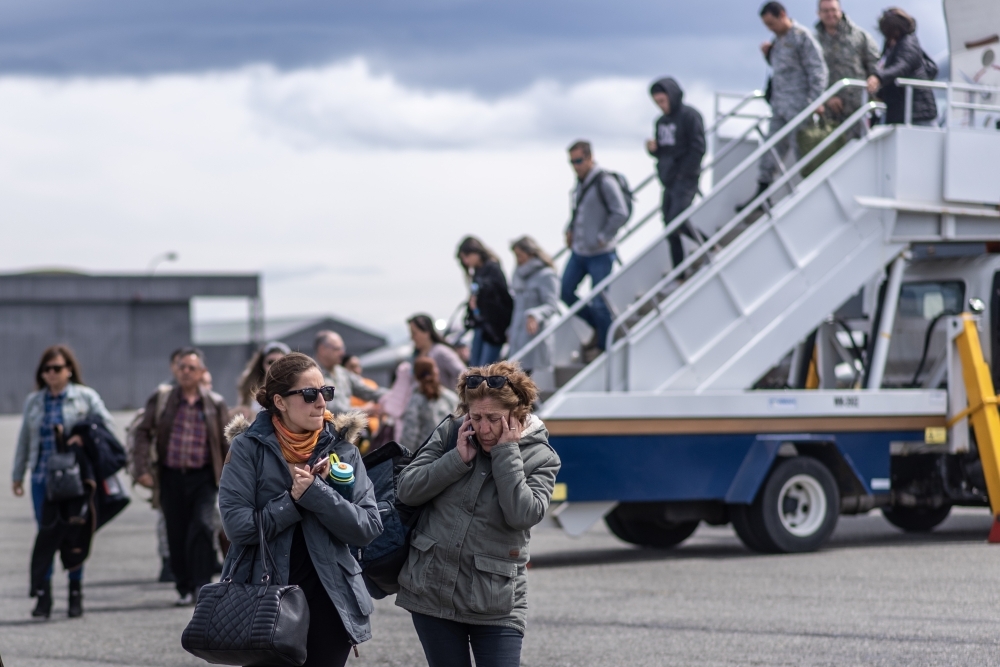 Relatives of people aboard the Chilean Air Force C-130 Hercules cargo plane that went missing in the sea between the southern tip of South America and Antarctica, arrive at Chabunco army base in Punta Arenas, Chile, on Wednesday. — AFP