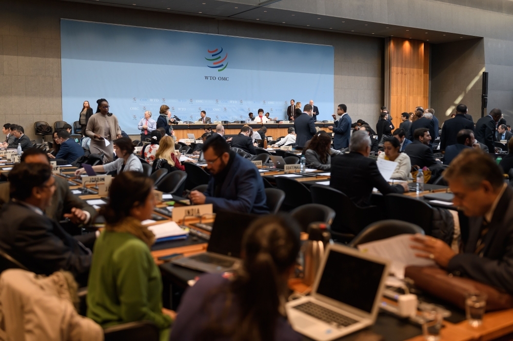 Delegates are seen prior to a general council meeting of the World Trade Organization (WTO) at the trade intergovernmental organization headquarters in Geneva in this Dec. 10, 2019 file photo. — AFP