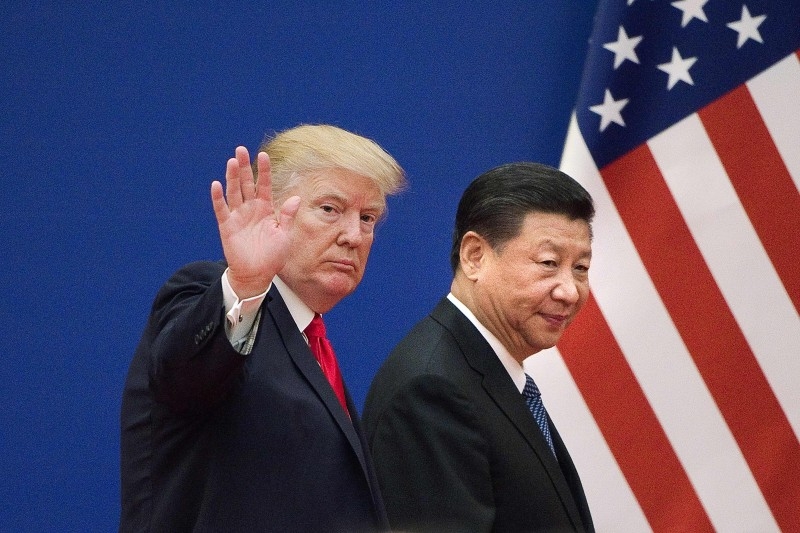  This file photo taken on November 9, 2017 shows US President Donald Trump and China's President Xi Jinping leaving a business leaders event at the Great Hall of the People in Beijing.  -AFP