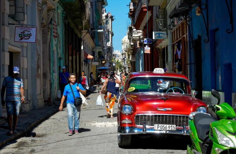 An old American car is parked in a street of Havana, on December 10, 2019. Cuba and the United States, former enemies of the Cold War, had a historic approach five years ago, but their relations deteriorated after the election of Donald Trump, who reinforced sanctions against the island. -AFP