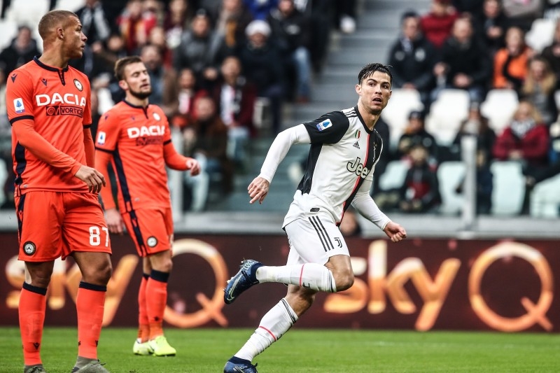 Juventus' Portuguese forward Cristiano Ronaldo celebrates after opening the scoring during the Italian Serie A football match against Udinese on Sunday at the Juventus Allianz stadium in Turin. — AFP 