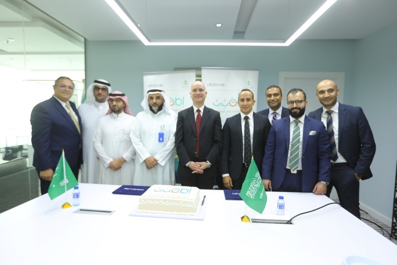 Dr. Abdullah M Assiri, assistant deputy minister for preventive health at the Ministry of Health; and Ashraf Daoud, Ashraf Daoud, general manager at AbbVie, with other officials after signing the cooperation agreement. — Courtesy photo