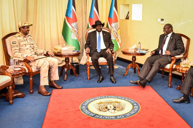 South Sudanese President Salva Kiir, center, South Sudan's opposition leader Riek Machar, right, and Sudan's deputy head of the Transitional Military Council Mohamed Hamdan Daglo 