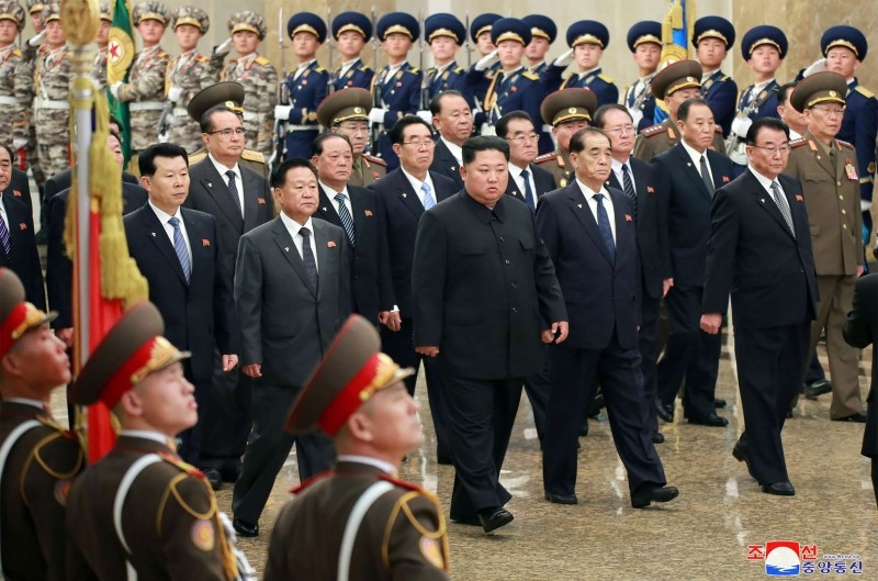 This undated picture released from North Korea's official Korean Central News Agency (KCNA) on Tuesday shows North Korean leader Kim Jong Un (C) visiting the Kumsusan Palace of the Sun in Pyongyang, North Korea. -AFP