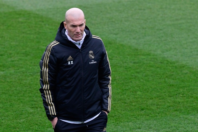 Real Madrid's French coach Zinedine Zidane attends a training session at the Real Madrid City sports facilities in Madrid on Tuesday, on the eve of their Spanish League football match against Barcelona FC. — AFP