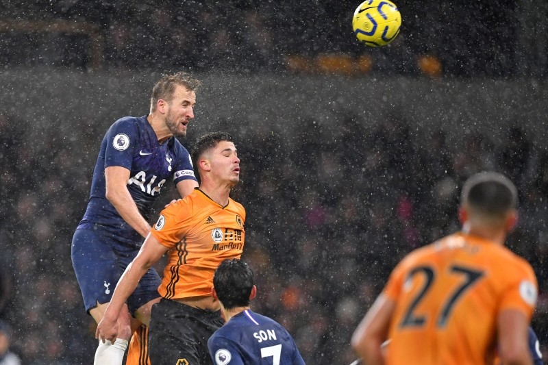 Tottenham Hotspur's English striker Harry Kane, left, wins a header during the English Premier League football match between Wolverhampton Wanderers and Tottenham Hotspur at the Molineux stadium in Wolverhampton, central England, in this Dec. 15, 2019 file photo. — AFP