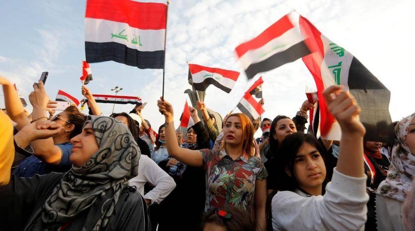 Women demonstrators hold Iraqi flags as they take part in a protest over corruption, lack of jobs, and poor services, in Baghdad, Iraq, in this Oct. 27, 2019 file picture. — Courtesy photo