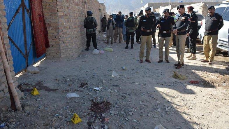 Pakistani police officials gather at the site of an attack by gunmen on a polio vaccination team on the outskirts of Quetta, Baluchistan, in this Jan. 18, 2018 file photo. — AFP