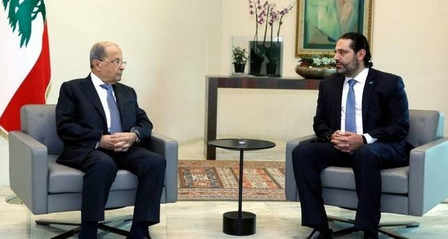 Lebanese President Michel Aoun, left, meets with Prime Minister Saad Al-Hariri at the presidential palace, Baabda, in this Oct. 21, 2019 file photo. — AFP