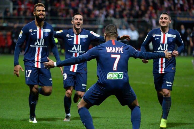 Paris Saint-Germain's Cameroon forward Eric Maxim Choupo-Moting (L) is congratulated by Paris Saint-Germain's French forward Kylian MBappe (C) after scoring a goal during the French League Cup round of sixteen football match against Le Mans FC on Wednesdayt the MMArena Stadium, in Le Mans, northwestern France. — AFP